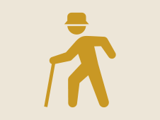 歩行補助具（杖）を使う人物を表すシルエットアイコン